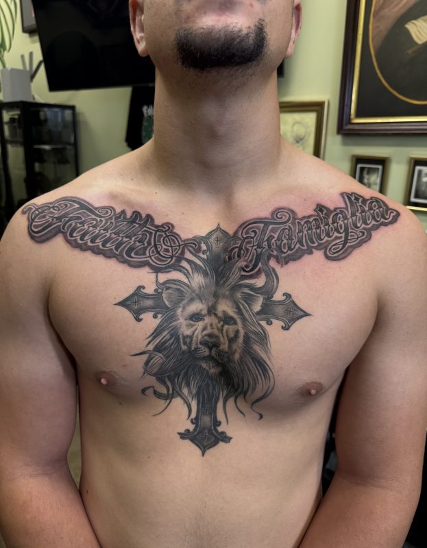 lion-cross-faith-familia-chest-tattoo-frank-luca-vatican-tattoo