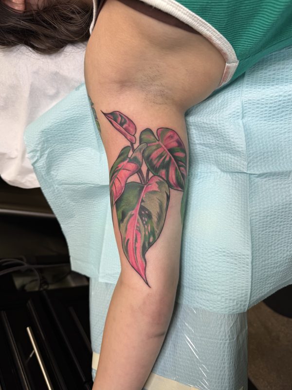 skull-red-eyes-upper-arm-tattoo-frank-luca-vatican-tattoo-delray-beach